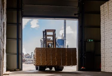 Packaged pulp is transported into the storage facility.